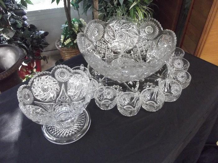 Cut Glass Punch Bowl with cups and companion fruit or ice bowl . Stunningly designed, would look great on any table setting. 