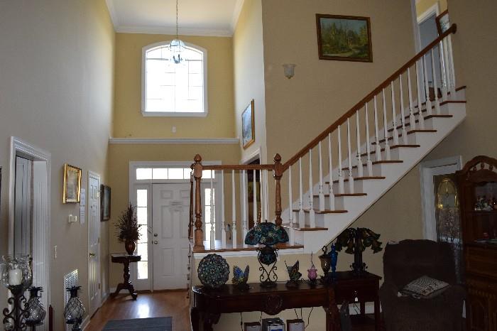 Gorgeous High Ceiling Entrance Foyer. Open Stairwell Leads to 2 Bdrms, Bonus Rm, 2 Full Bath and Walk Out Floored Attic Storage