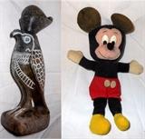 Carved Stone Inuit? Statue and small Mickey Mouse