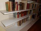 Living Room: A closer view of the shelves which are for sale. There is a total of 26 shelves, 9 vertical wall brackets and 53 shelf arms. The shelves are as follows: 5 are 41"; 5 are 58"; 8 are 61"; 6 are 64"; 2 are 87". They can be removed on Sunday late afternoon.