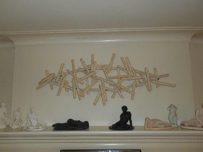 Living Room:  A BROTHER MEHL (signed and dated 1989) paper sculpture measures 65" wide x 25" tall; several sculptures by local artist/homeowner.