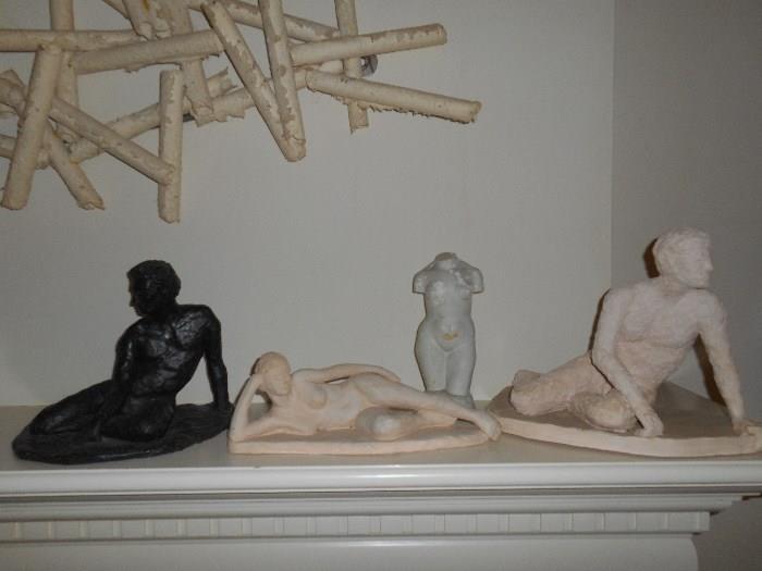 Living Room:  A closer view of the many sculptures on the mantel.