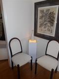 Dining Room: Two of the six HOUSE OF DENMARK side chairs (2 arm chairs are also part of the set); the "Oak Tree" framed print measures 41" x 35"; a lighted pedestal is 10" square and 30" tall and displays a German porcelain vase.