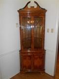 Dining Room: A very handsome corner unit with two glass panel doors and two lower doors. It measures 7' tall x 33" wide.