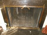 Living Room: The brass fireplace screen is 44" wide.
