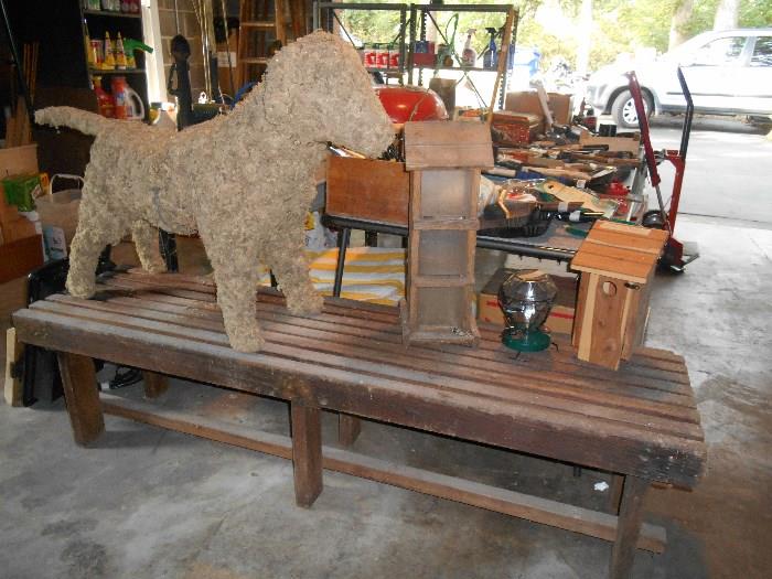 Garage:  A two-piece dog topiary (just add flowers); two bird houses; one hummingbird feeder; and a neat slatted bench (another bench like it is nearby).