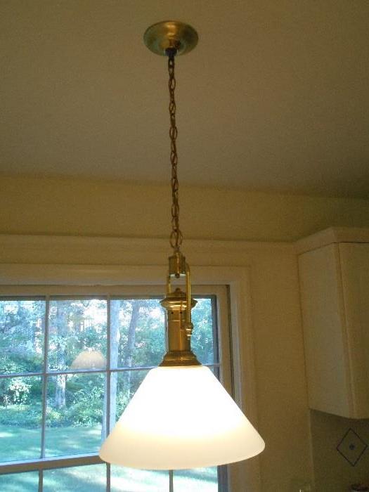 Kitchen:  The brass and white glass shade light fixture is for sale.  (Arrangements must be made to remove it.)  