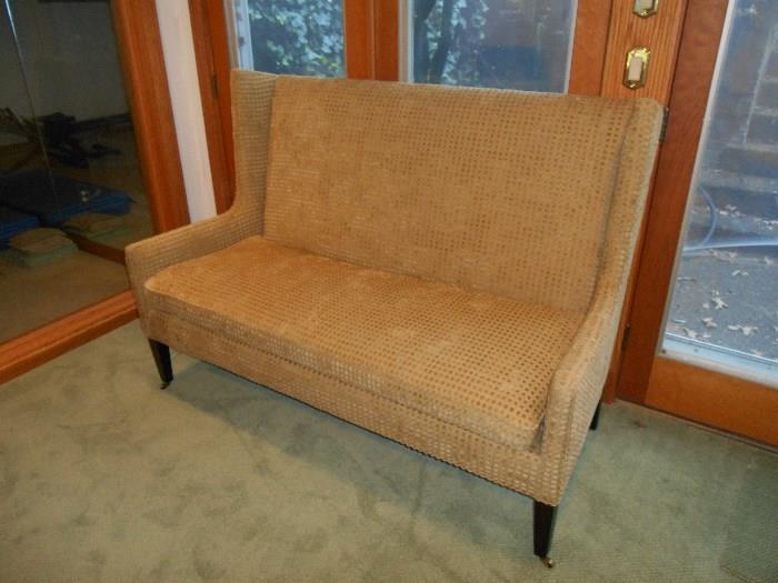 Lower Level:  A custom made love seat/sofa from EXPRESSIONS.  It is 65" wide with a 44" high back.