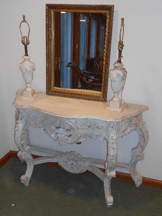 Lower Level:  A second painted console is shown with two marble/alabaster lamps and a gold frame mirror.  This console measures 48" wide x 15" deep x 33" tall.