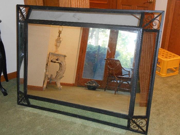 Lower Level:  A large metal black framed mirror measures 52" x 40."  It can be hung vertically or horizontally.