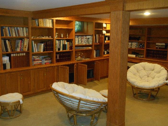 Lower Level:  Another view of the library with two of three Papason chairs shown.  We also have three rattan stools and pads and one small rattan table with glass top.  There are numerous books on beer brewing and chemistry....many are in German.
