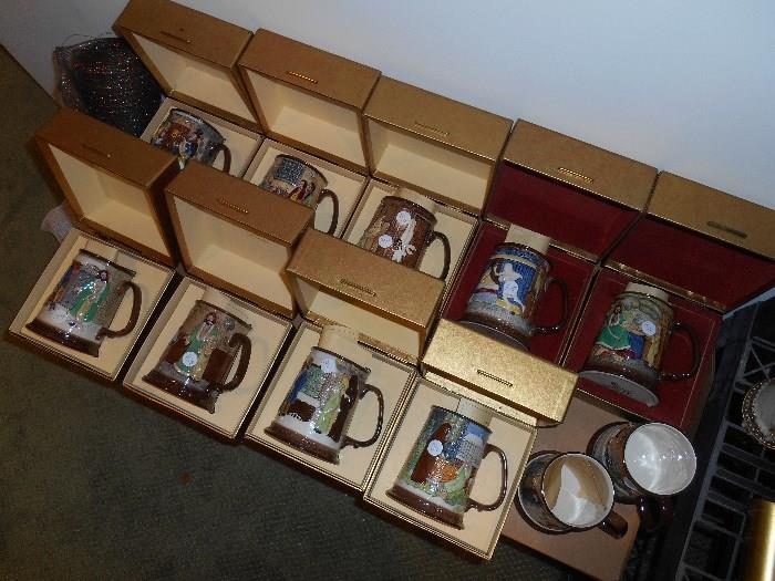 Lower Level-Christmas Area:  Limited Edition "John Beswick" Royal Doulton Christmas Carol Tankards.  We have years 1972-1982, 11 total.  Two (1981 and 1982) do not have their boxes; 1974 is "as is"--has a repaired handle. 