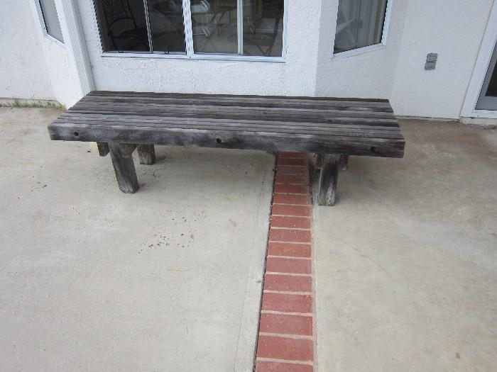 Great red wood weathered bench just waiting for your yard!!  1/2 off now $25