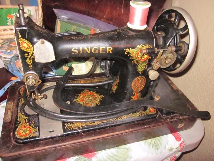 Beautiful antique Singer w/ parts by Singer. 50% off Saturday $50