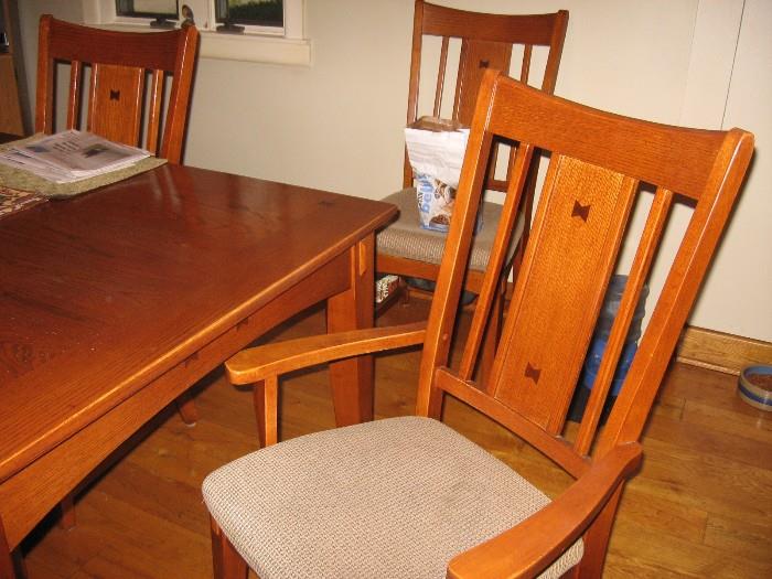 Dining set - 64" X 42" table with 18" leaf and 6 chairs, beautiful woodwork (chair cushions could easily be reupholstered. (1 chair needs minor cushion repair.)