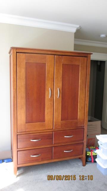 "Bassett Furniture" Cherry armoire, sliding doors (TV or storage?)  and 4 large drawers.