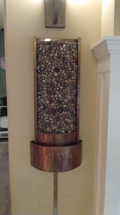 Wall Fountain, Metal and stone w/light.  size 14w (at base and narrows to 11w) x 31h 