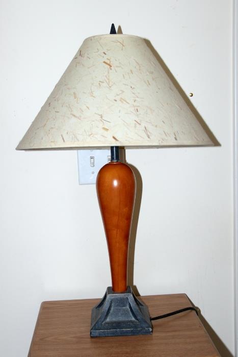 Wood table lamp with iron base.