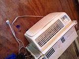 One of two window unit air condtioners