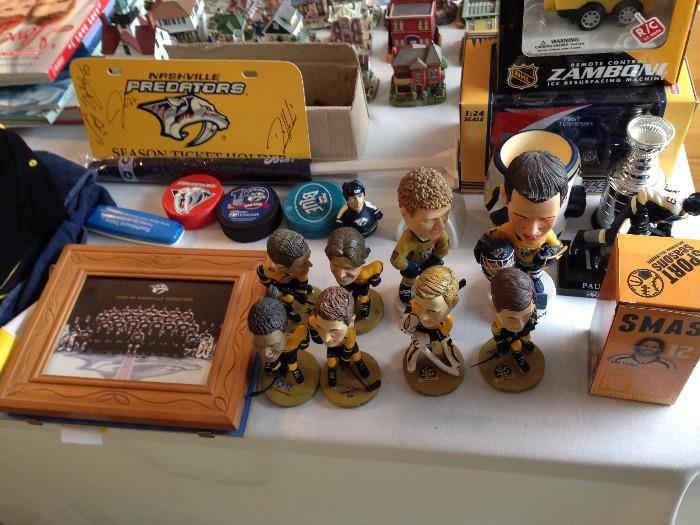 Some of the Predators season ticket holder collectibles, plus lots of jerseys, flags, scarf, framed print