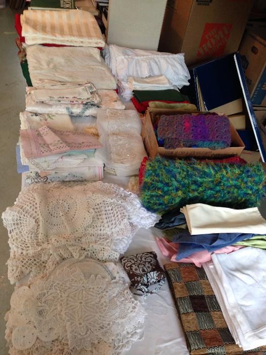 Large assortment of handwork, tablecloths etc....