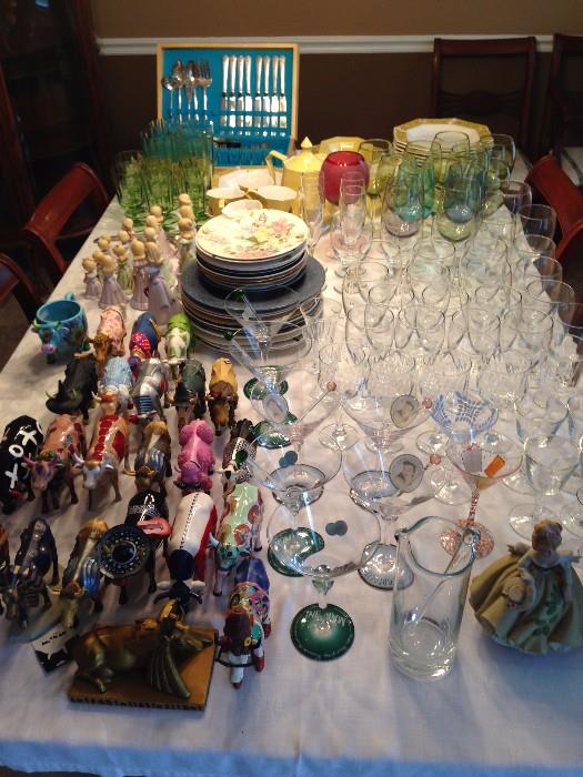 Assortment of stemware, fancy glassware, birthday dolls, Cow Parade cows