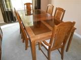 contemporary dining table with one leaf.