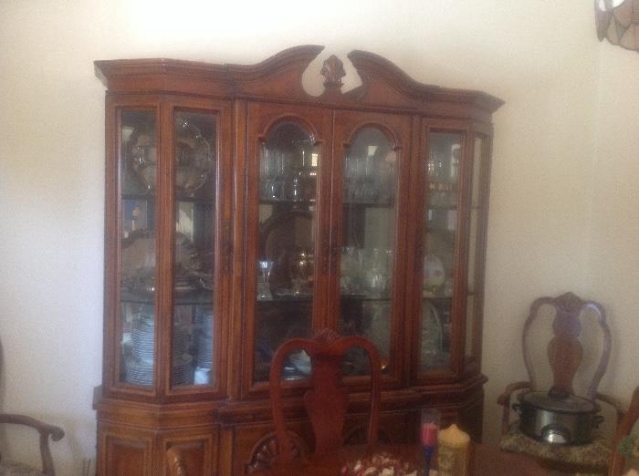 Gorgeous china cabinet, mirrored back, beveled glass, lights inside. 