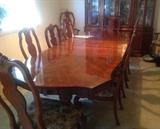 Double-pedestal table to seat 8, sold with 8 chairs, plus 2 bonus chairs.