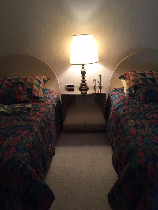 Twin beds, headboard and bedding