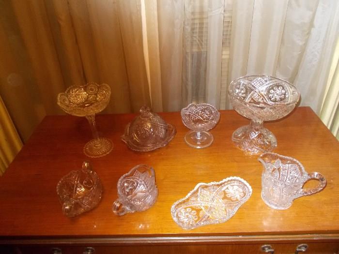 8 Pieces of PRESSED GLASS  - includes a BUTTER DISH, CREAMER/SUGAR, CANDY DISHES ON PEDESTAL, CREAMER, MINTS PLATE - If you like Pressed Glass...you are in luck at this sale - good pieces/good variety!!!!!!!