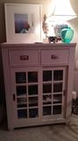 White slider cabinet, many lamps,