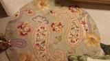 Round wool rug, several nice rugs in this condo.  Matching 5 by 7 rectangle one like this.  