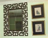 Wall mirror plus artwork.