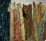 Large bolts of exquisite fabrics.