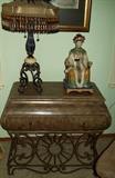 Nice small table with drawer plus statue and lamp.