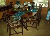 Beautiful dining room table with six chairs.