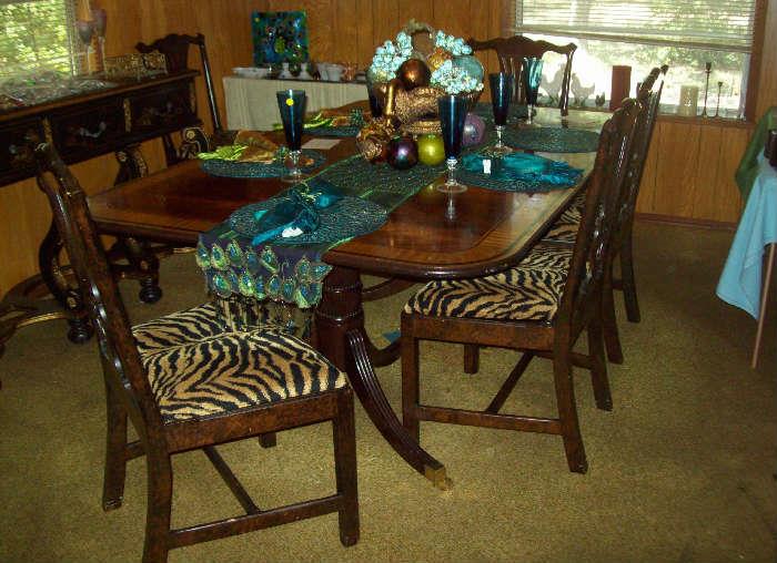 Beautiful dining room table with six chairs.