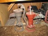 Two antique cast iron pumps