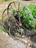 Antique cast iron tractor wheels, and other farm implement wheels
