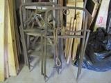 two of three antique cast iron hay harpoons