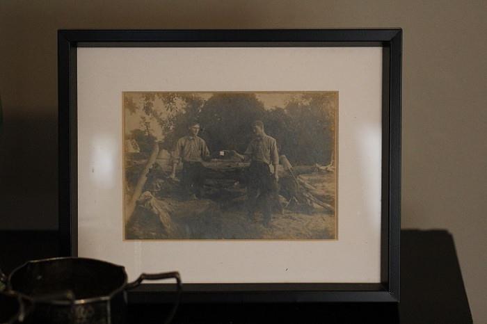 Wonderful framed antique photo of two friends camping.