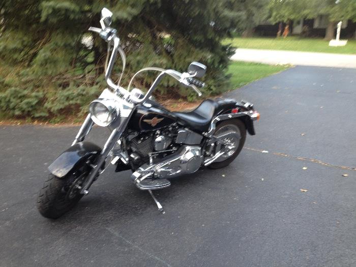 1998 Softail Harley Davidson motorcycle. 12,000 miles.  Asking $7500.00. 