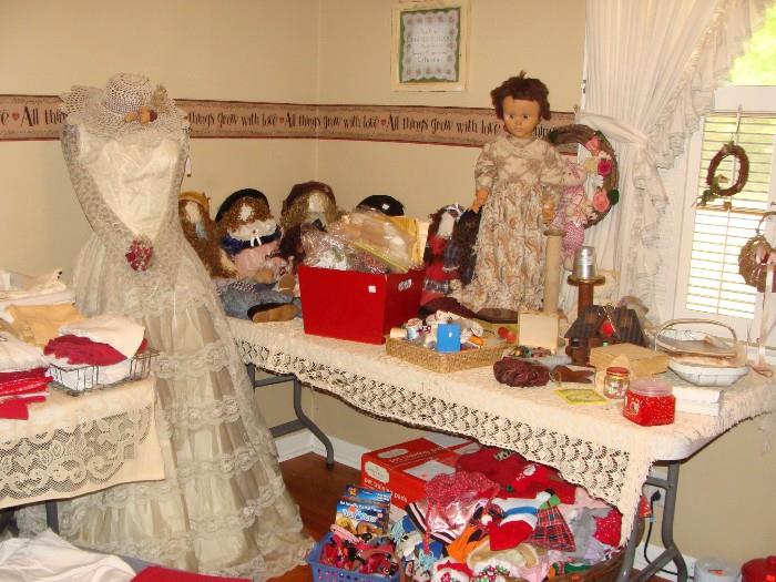Vintage wedding dress, dolls and quilts
