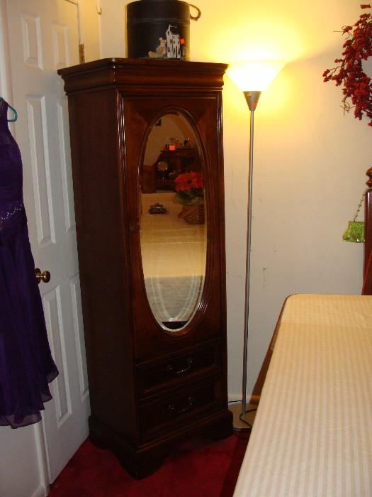 Beautiful narrow Antique Wardrobe with Oval Beveled Mirror
