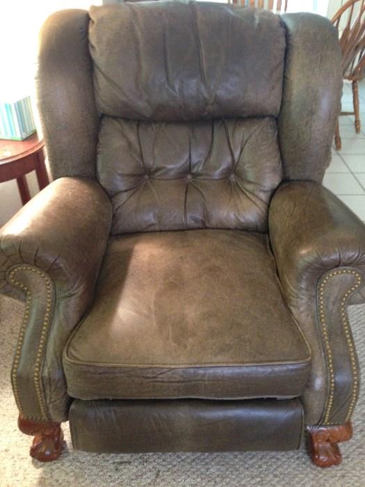 Sturdy, leather recliner by Lane has beautiful claw feet and cushions that invite you to "stay a while"....