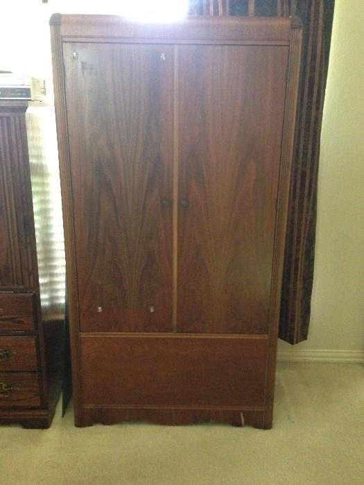 Antique wardrobe--restored and converted to an entertainment center with secret compartment!  (see next photo)