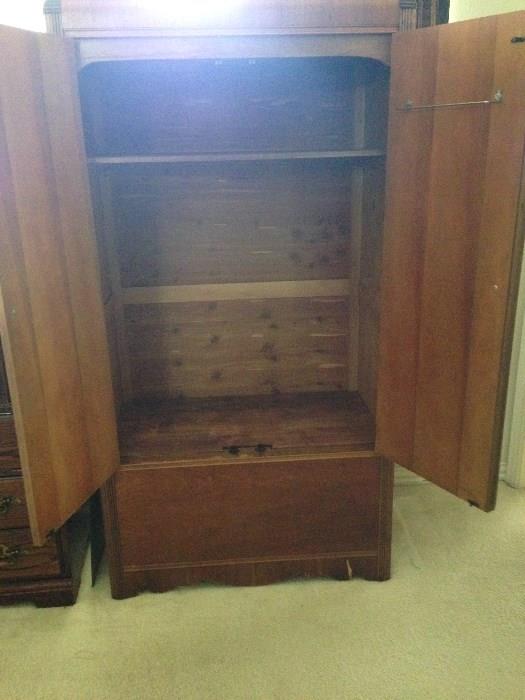 Antique wardrobe, interior--restored and converted to an entertainment center with secret compartment!