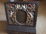 Antique bookstand with all of the pretty putti