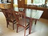 Nicols and Stone table and chairs in brand new condition